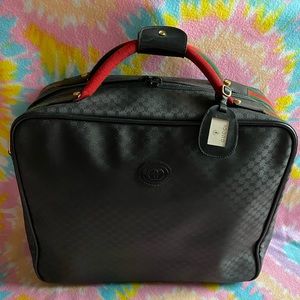 Gucci Suitcase bag - Authentic!  I have truly enjoyed this compact, sleek bag.